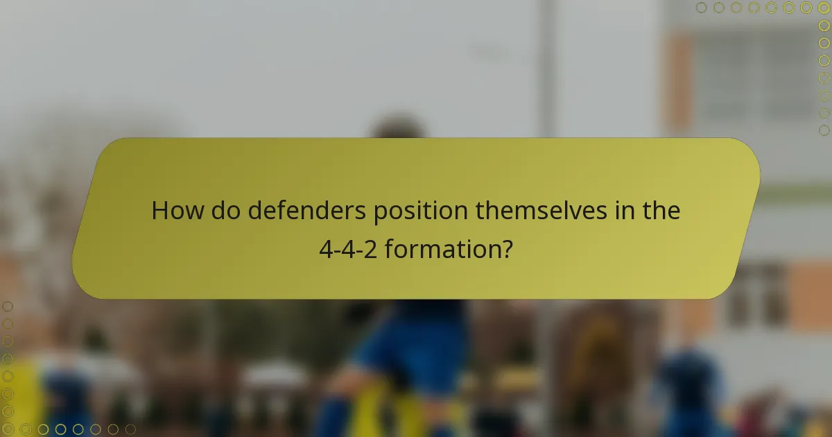 How do defenders position themselves in the 4-4-2 formation?